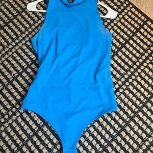 Woman’s Express Blue One Piece bodysuit top perfect for spring & summer Medium